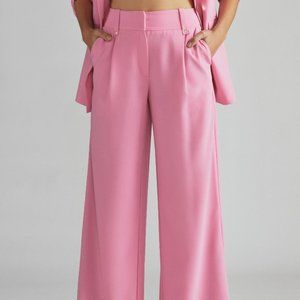 Anthropologie Carnation Flared Trousers in Pink